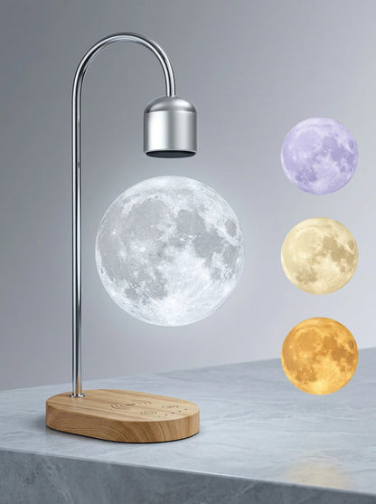 Moon-shaped lamp with wooden base and arm on a gray surface, with moon phases displayed.