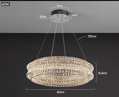 luxury staircase chandelier installation with crystal reflections